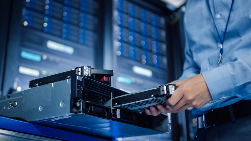  IT team managing servers with secure Backup as a Service to protect data during VMware platform transitions 